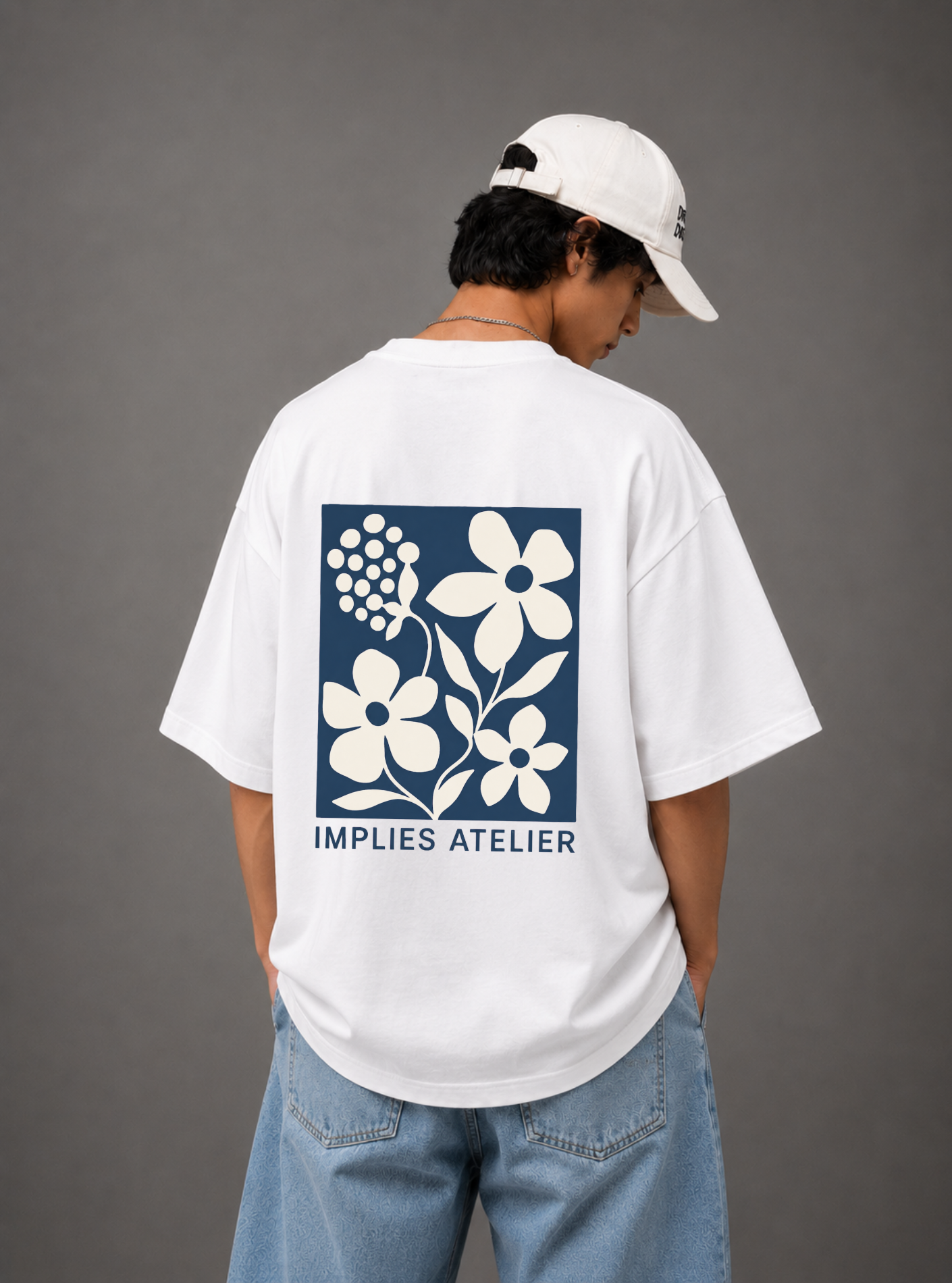 Implies Atelier Signature Floral Back Print Oversized Tee | Black & White
