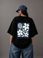 Implies Atelier Signature Floral Back Print Oversized Tee | Black & White
